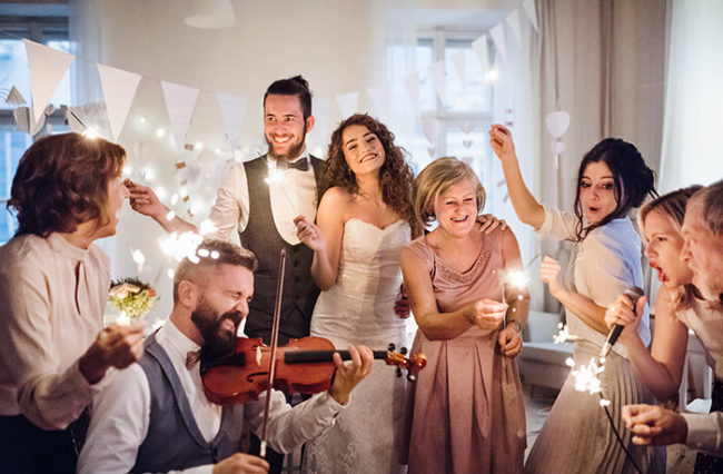 Wedding sparklers by bride and groom